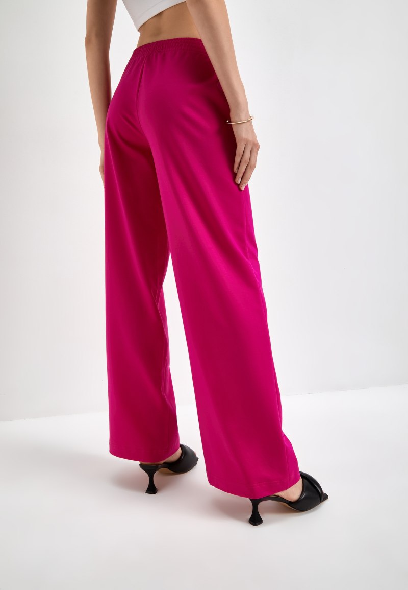 Брюки цвета фуксия