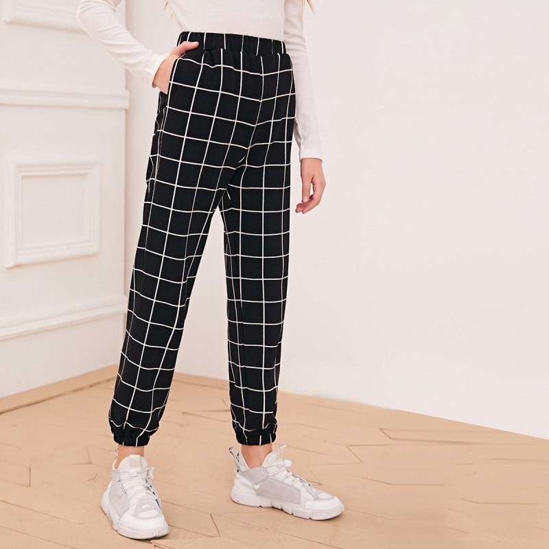 Брюки в клетку