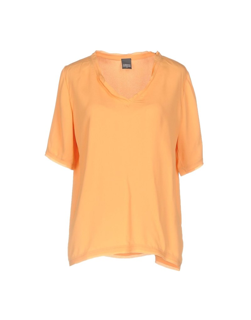 Блузы абрикосового цвета