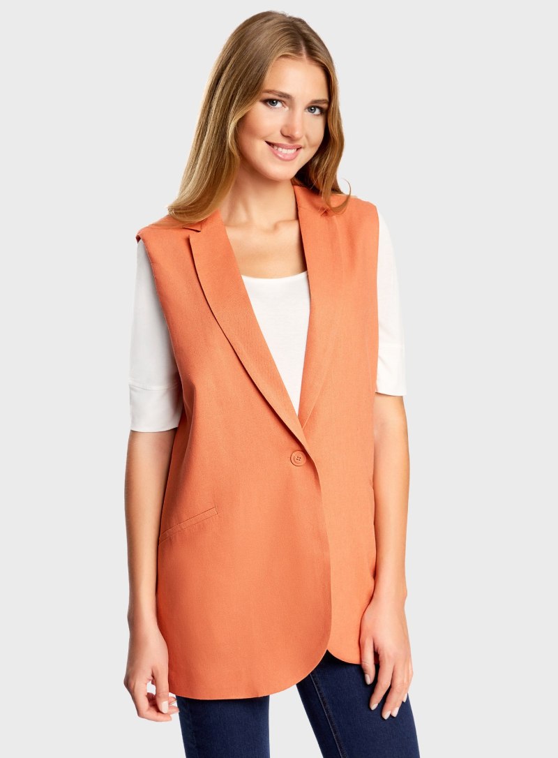 Жилеты женские модные