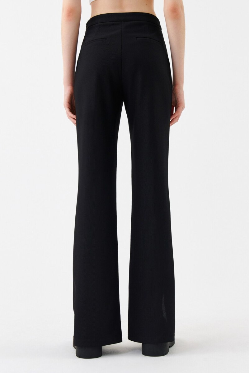 Черные брюки клеш от колена