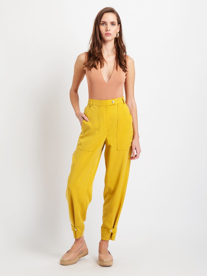 Брюки горчичного цвета женские