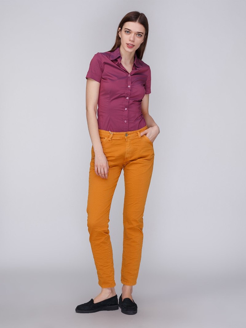 Джинсы женские горчичного цвета