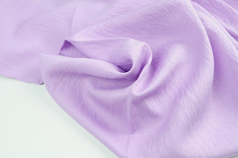 Бледно фиолетовая ткань